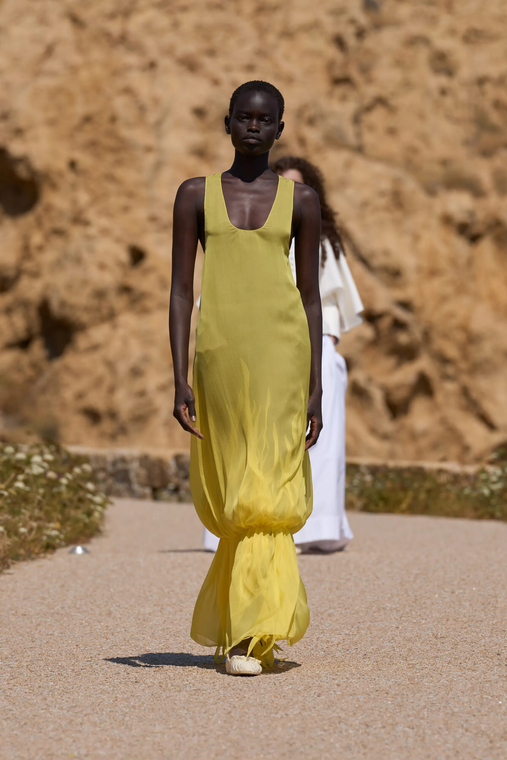 Jacquemus Spring Summer 2027 sheer ivory layered dress with voluminous gathered skirt.