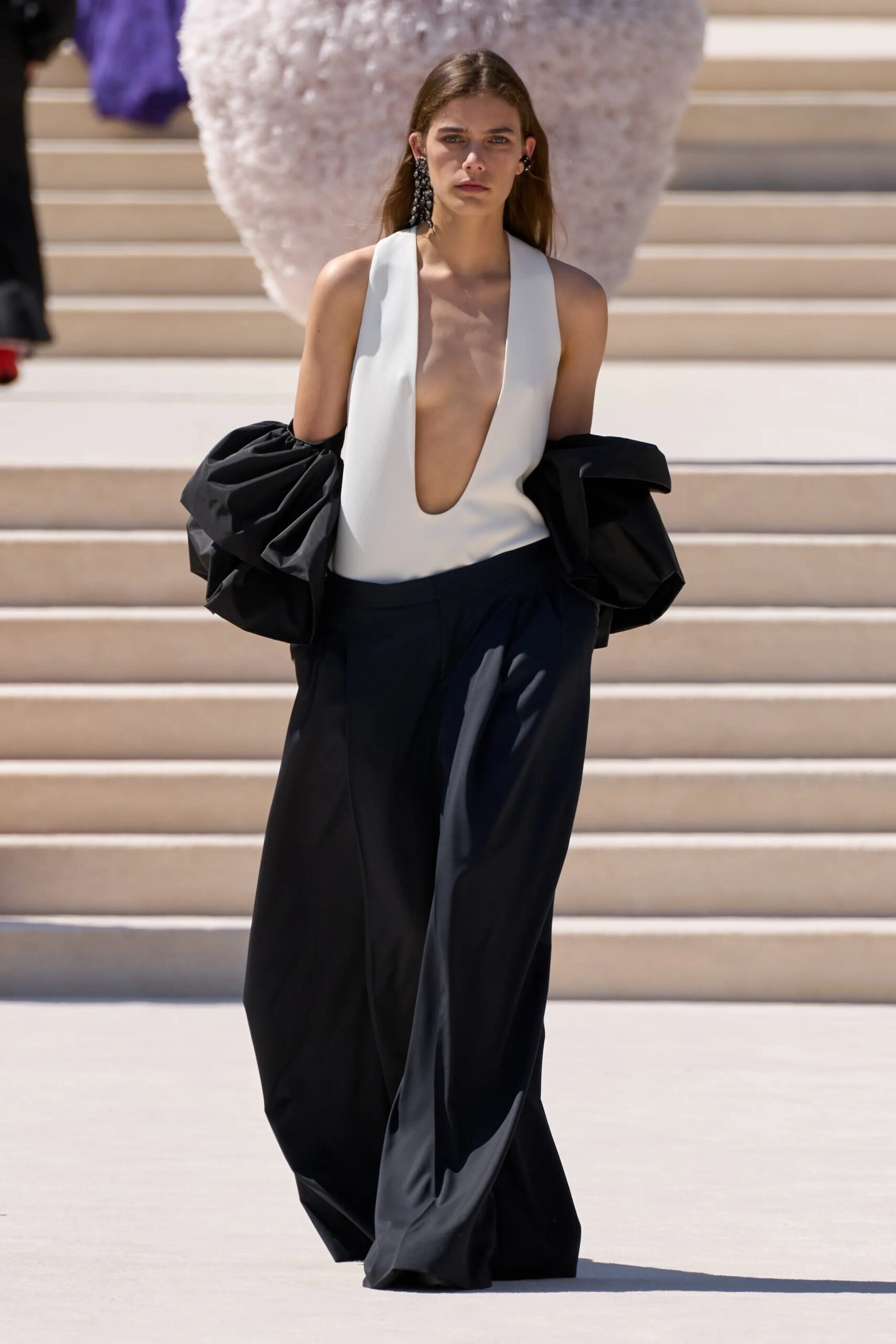 Model wearing a black and ivory evening gown from the Balenciaga Fall 2026 Couture collection