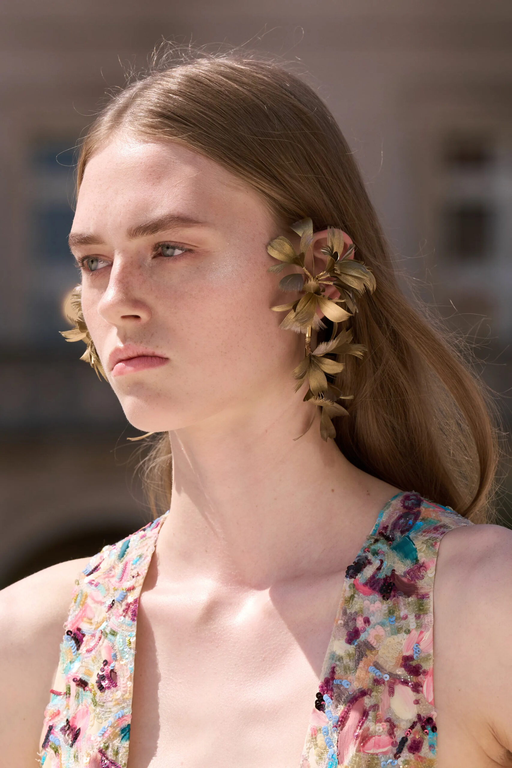 Gold botanical ear jewelry from the Balenciaga Fall 2026 Couture collection by Pierpaolo Piccioli