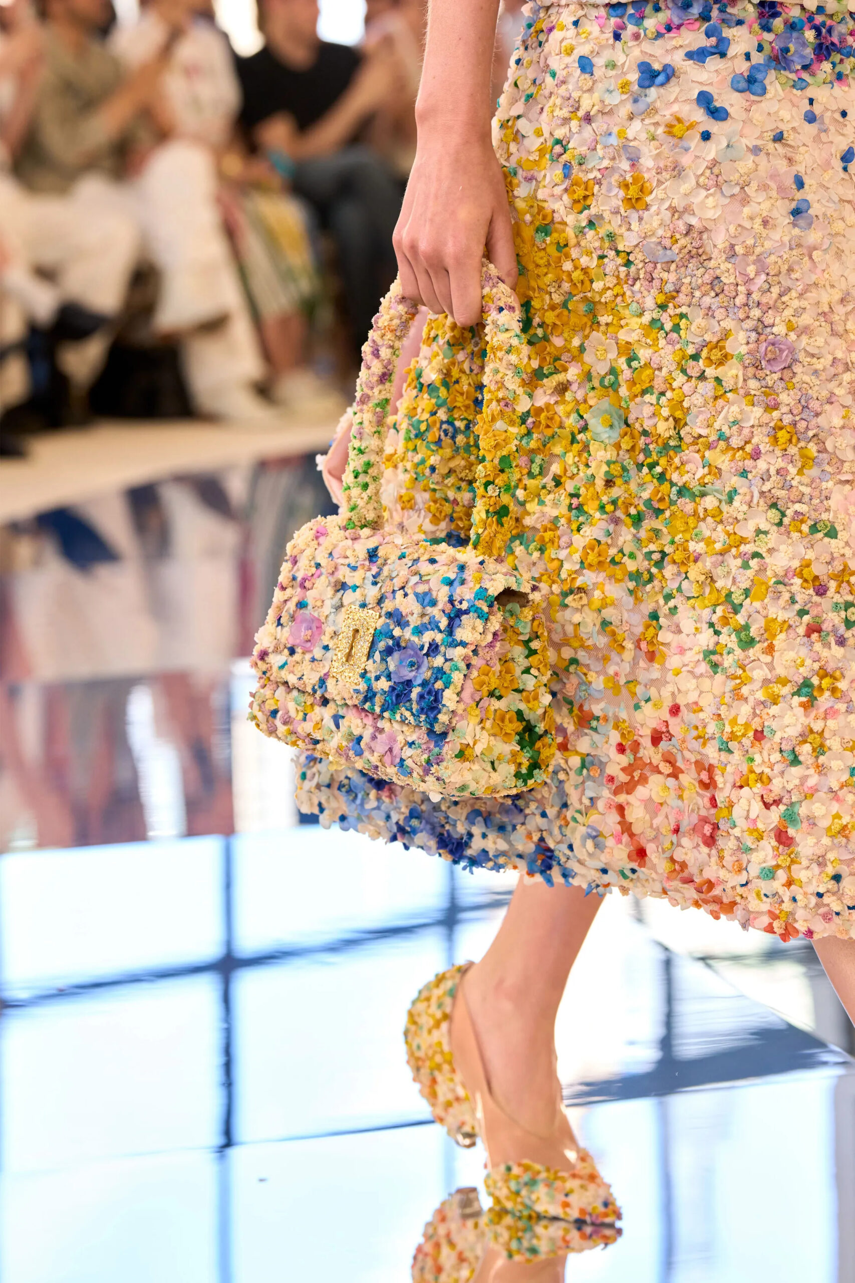 Floral embroidered handbag and botanical gold pearl bracelet from the Schiaparelli Fall 2026 Couture collection by Daniel Roseberry