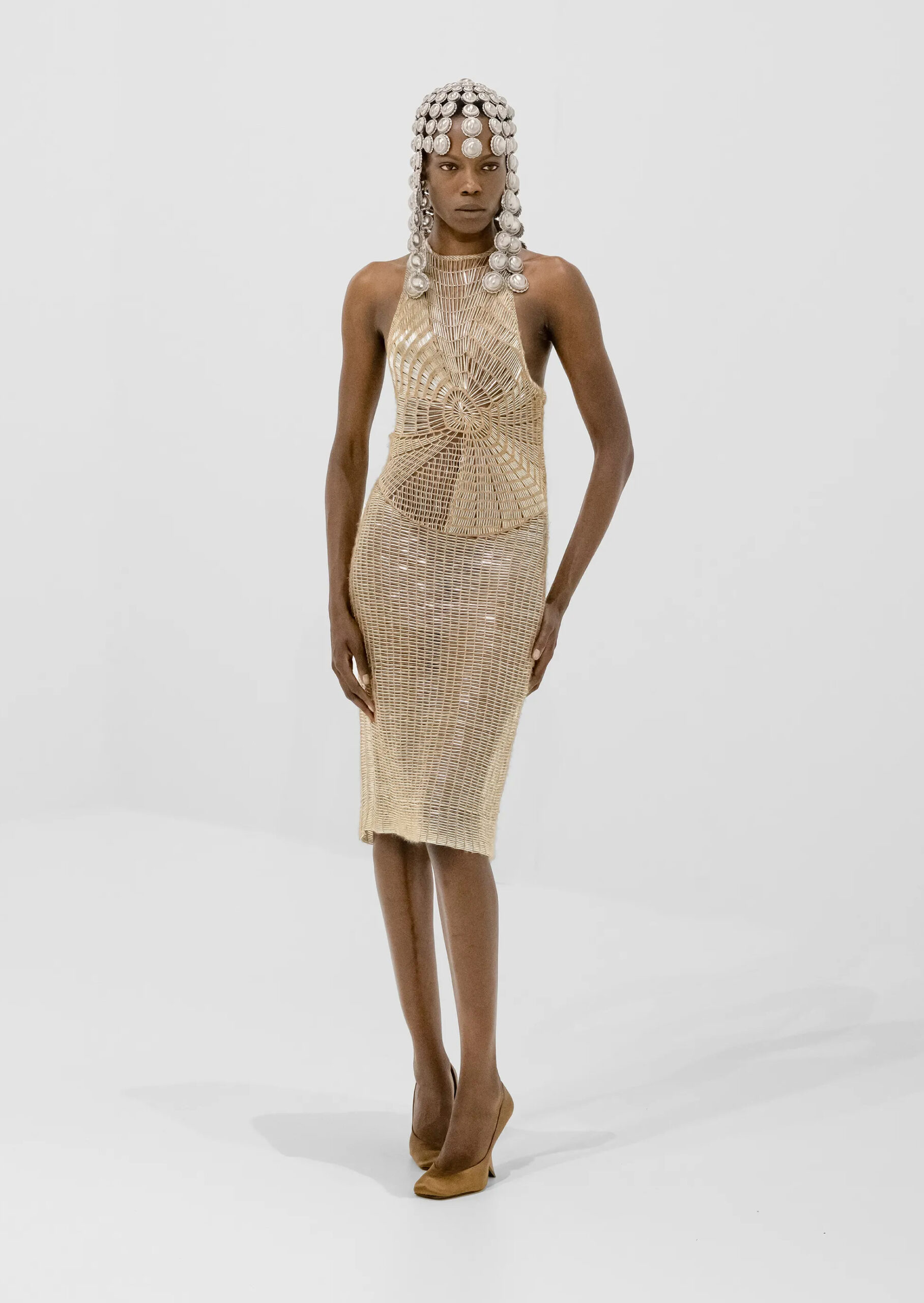 Gold beaded mini dress with oversized velvet bow from Jean Paul Gaultier Fall 2026 Couture
