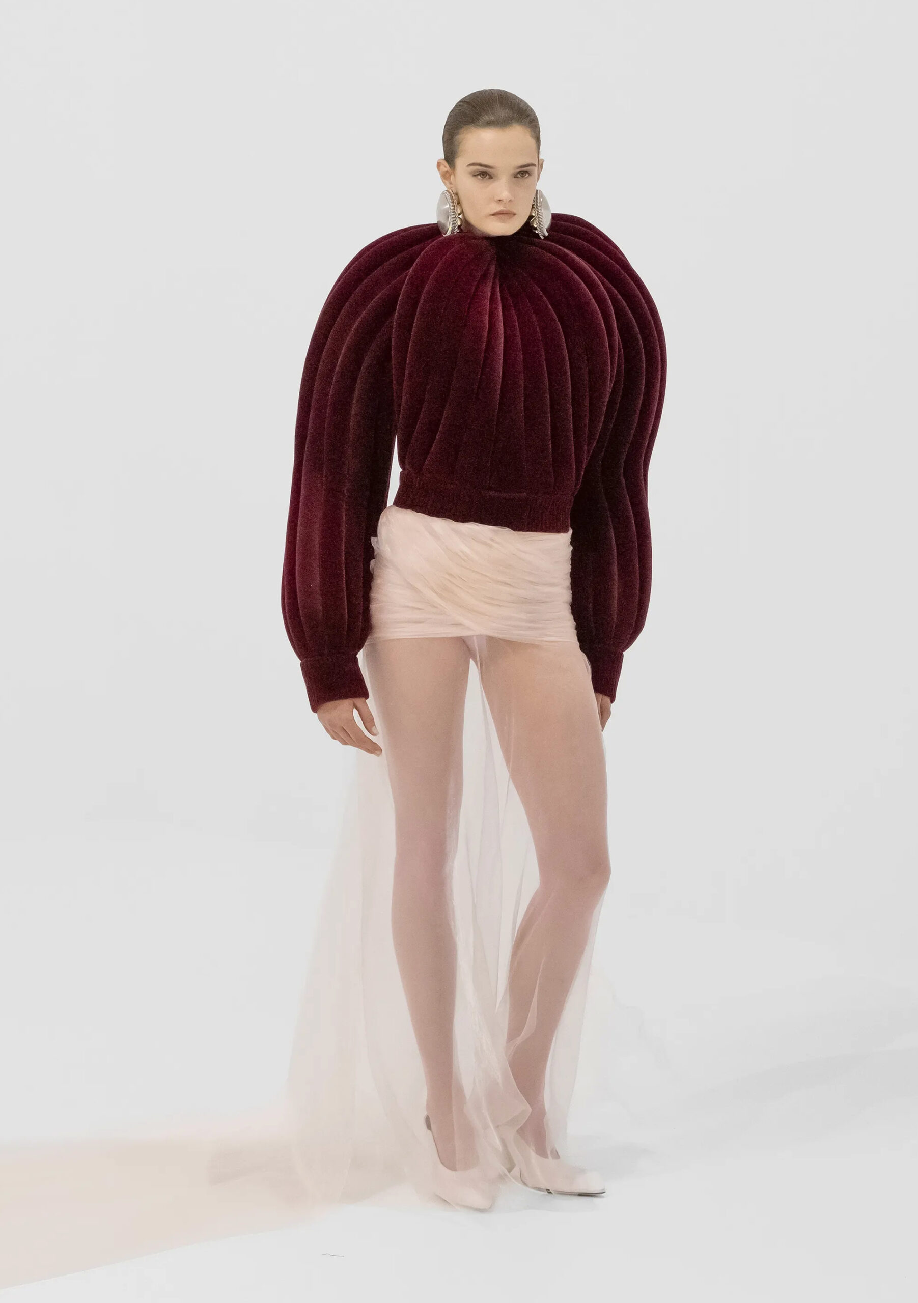 Burgundy sculptural velvet look with sheer train from Jean Paul Gaultier Fall 2026 Couture