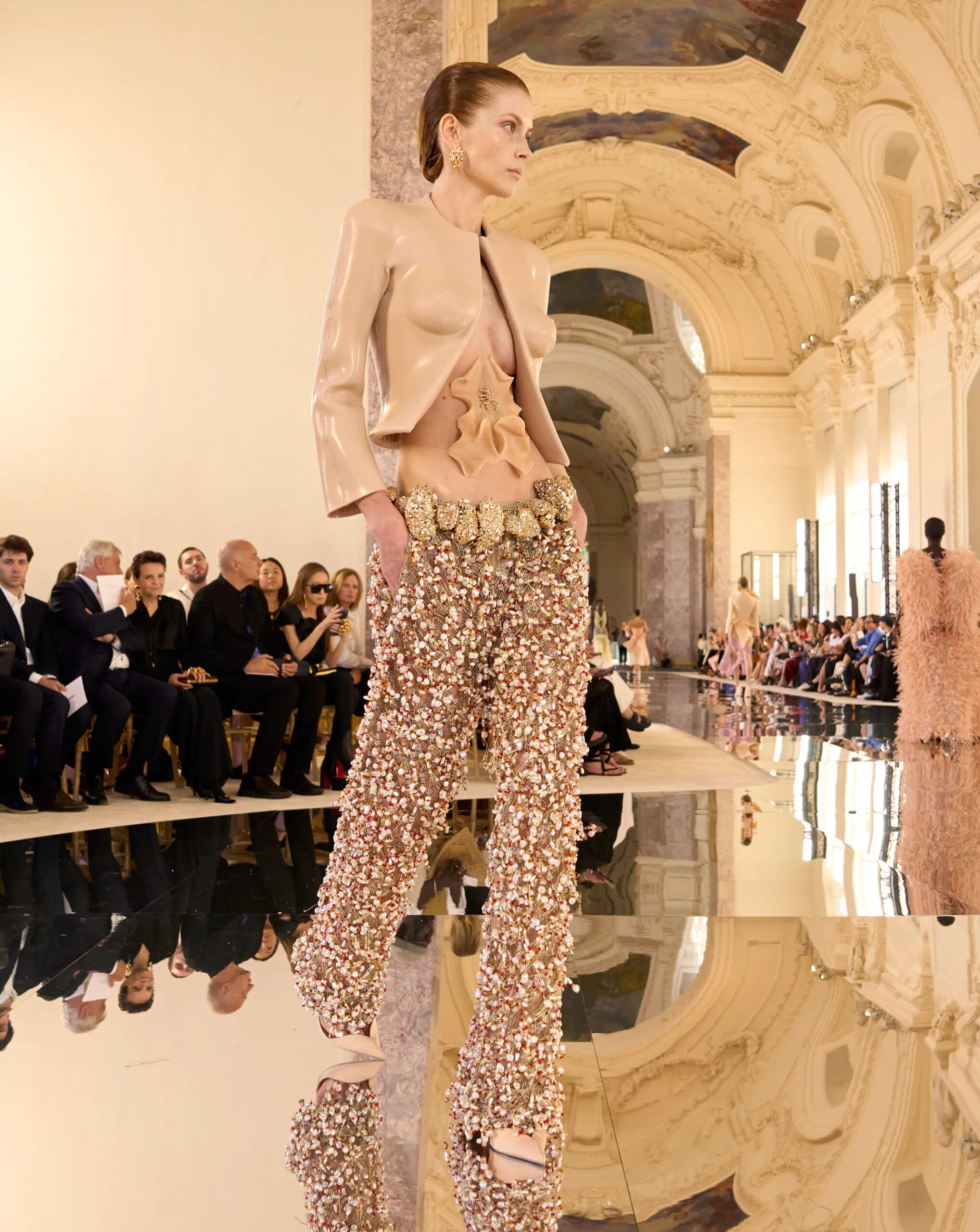 Schiaparelli Fall Winter 2026 Couture embellished trousers paired with sculptural cropped jacket.