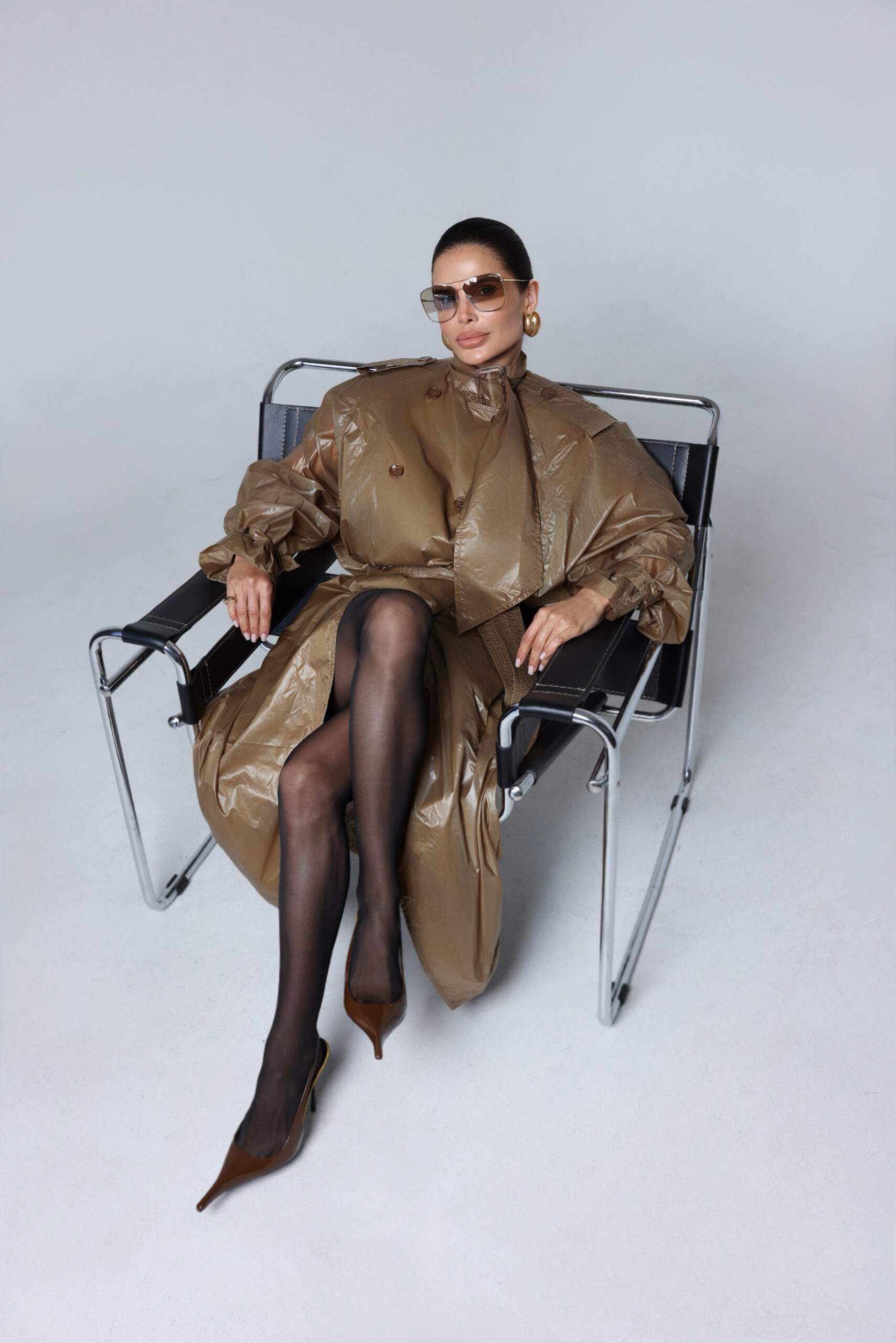 Victoria Barbara in a Saint Laurent editorial portrait showcasing sculptural tailoring, neutral tones, and refined modern elegance