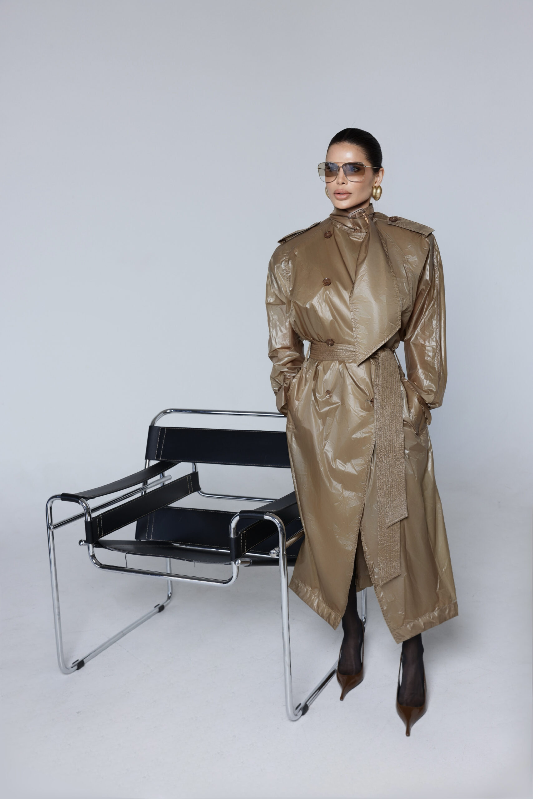 Victoria Barbara wearing Saint Laurent in an editorial fashion portrait highlighting sculptural tailoring, oversized proportions, and minimalist styling